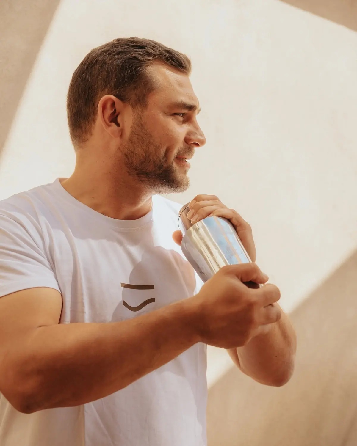 A Dune bartender with a shaker